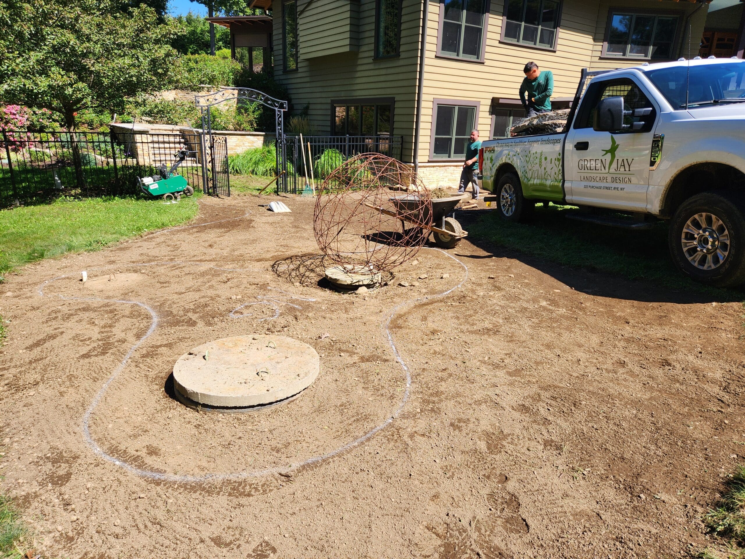 White lines indicate where gravel ends and planting begins for this new garden zone.