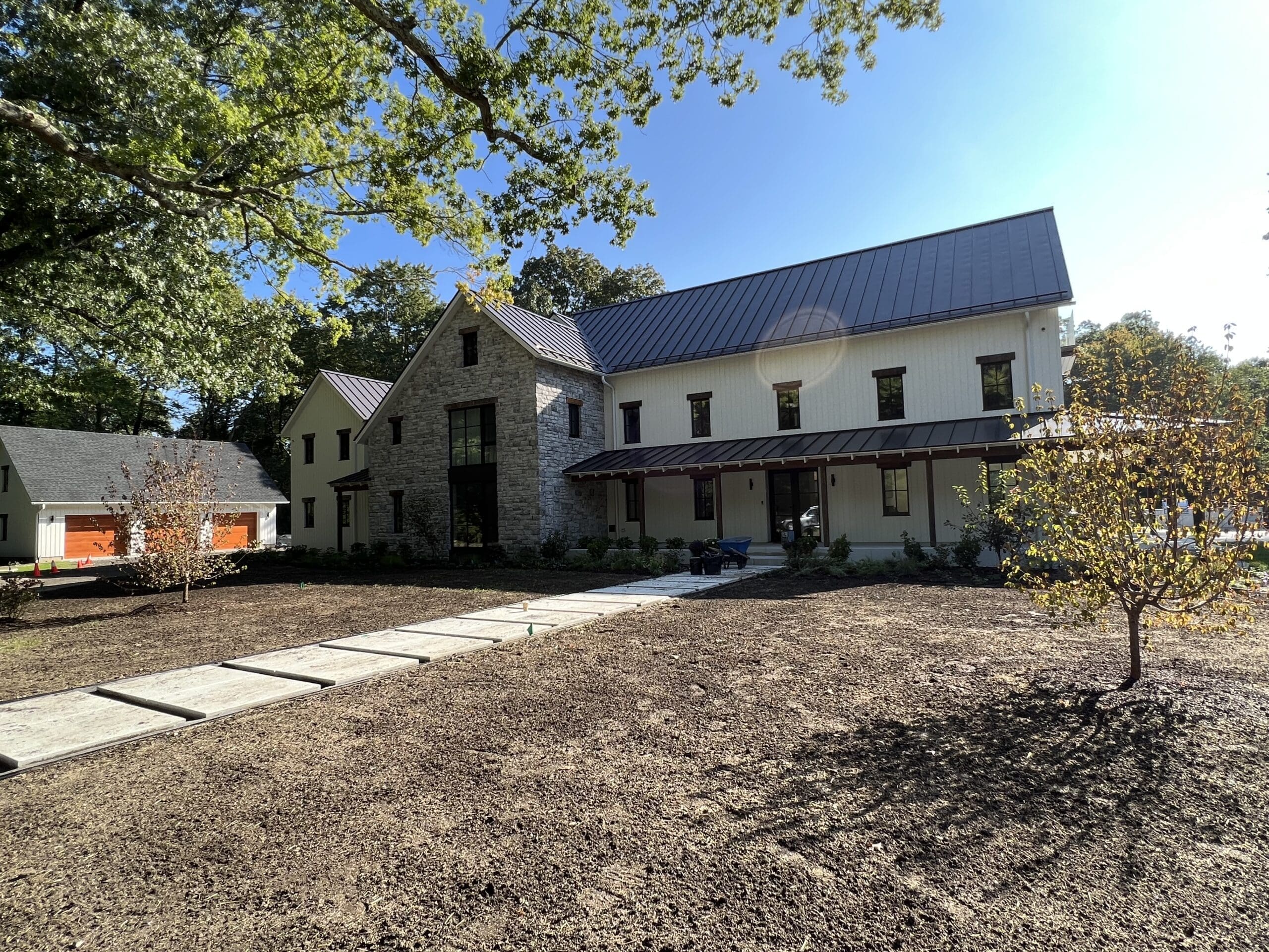 Extensive soil amendments were applied to the front yard lawn and garden beds to counteract compaction and pollution from construction.